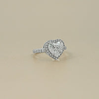 Halo With Accent Diamond Engagement Ring