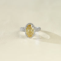 Fancy Vivid Yellow Oval Halo Accent Diamond Ring