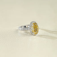 Fancy Vivid Yellow Oval Halo Accent Diamond Ring